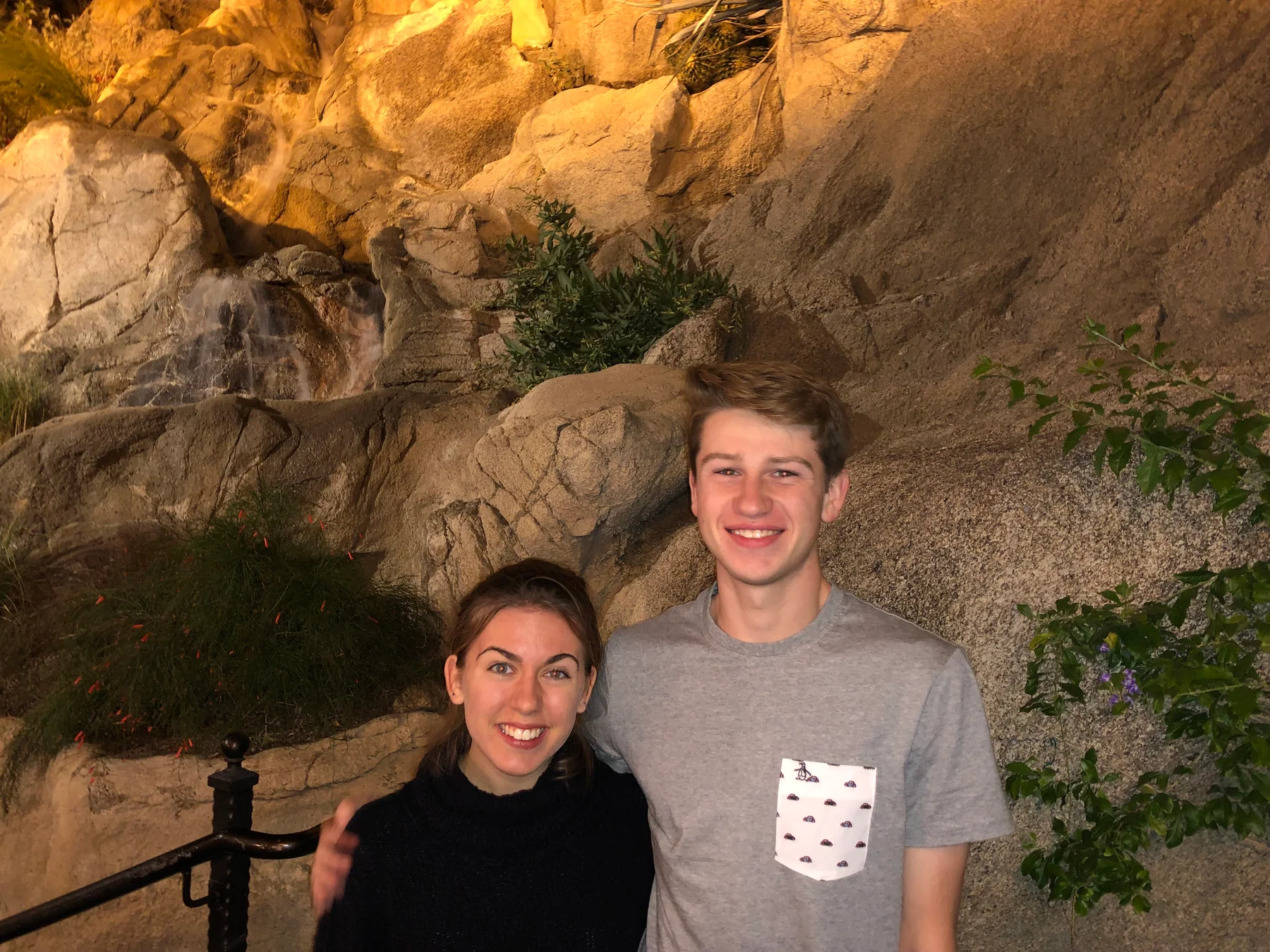 Anna Margaret and Hugh exploring a rocky cave