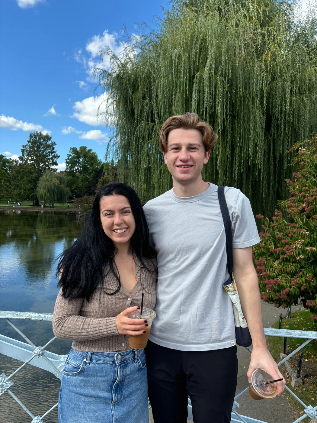 Anna Margaret and Hugh standing together beside a pond